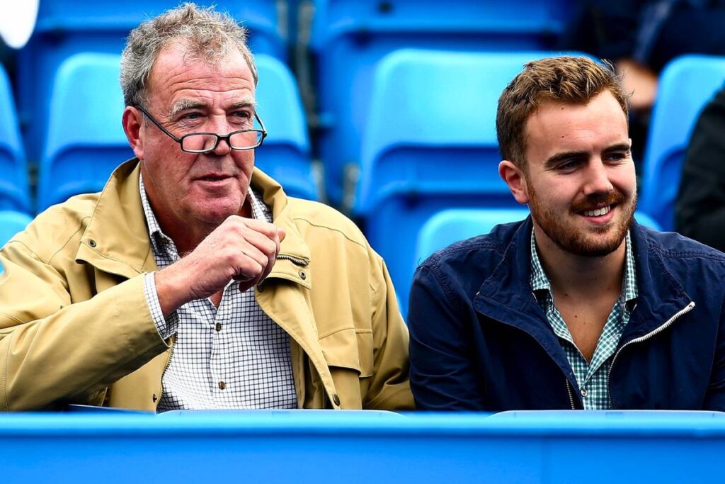 finlo clarkson - british tv presenter jeremy clarkson son, both father and son watching a game together while sitting together in the stadium